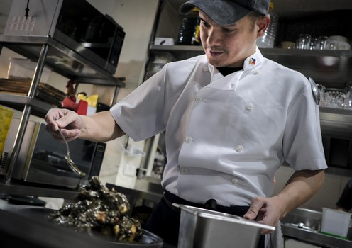 Philippine chef Miguel Moreno works in his kitchen at Palm Grill Restaurant in suburban Quezon City, northern Manila, Nov. 8, 2024.