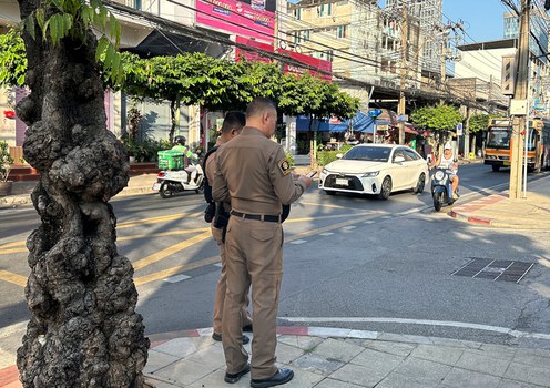 Thai police stand outside an immigration detention center of the Immigration Bureau where Uyghur detainees are held in Bangkok, Jan. 11, 2025.