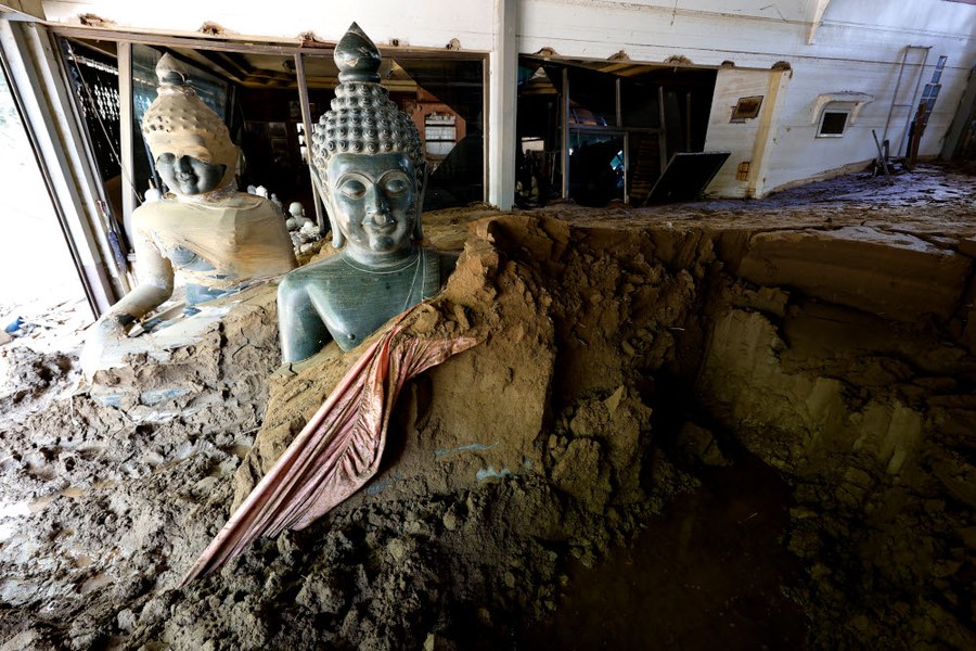 Buddha statues covered in mud are seen in Mae Sai district, in northern Thailand’s Chiang Rai province, Oct. 25, 2024.