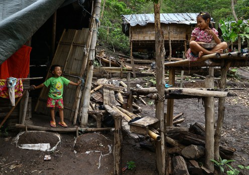 School children chat at a Myanmar refugee camp for Internally Displaced Persons near the Thai border in this photo taken in mid-2024.